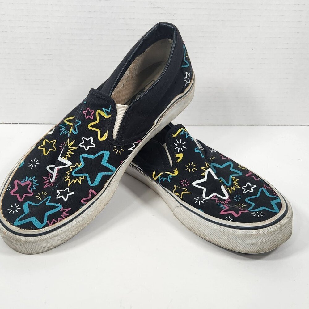 Vans Off The Wall black with colored stars slip on Men’s size 6.5 Women’s size 8